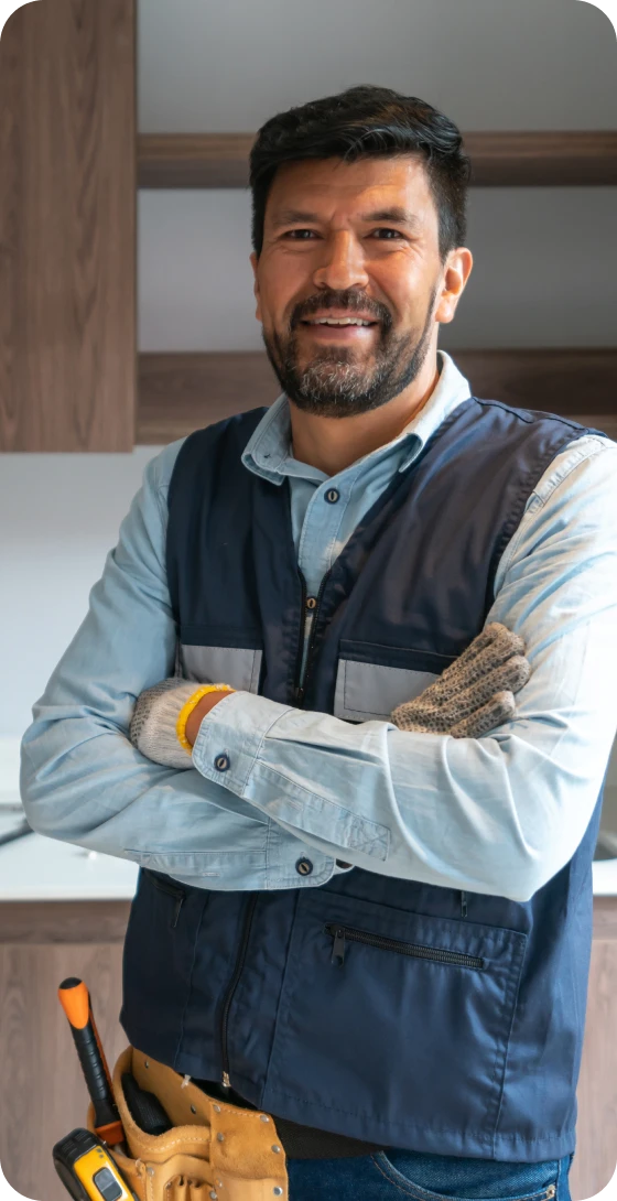 Confident worker in a blue vest